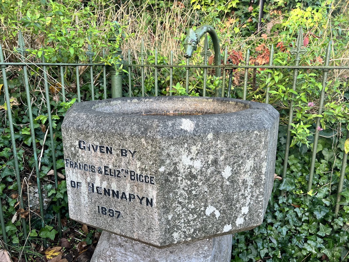 A fountain with the text 'Given by Francis and Elizabeth Bigge of Hennapyn 1897'